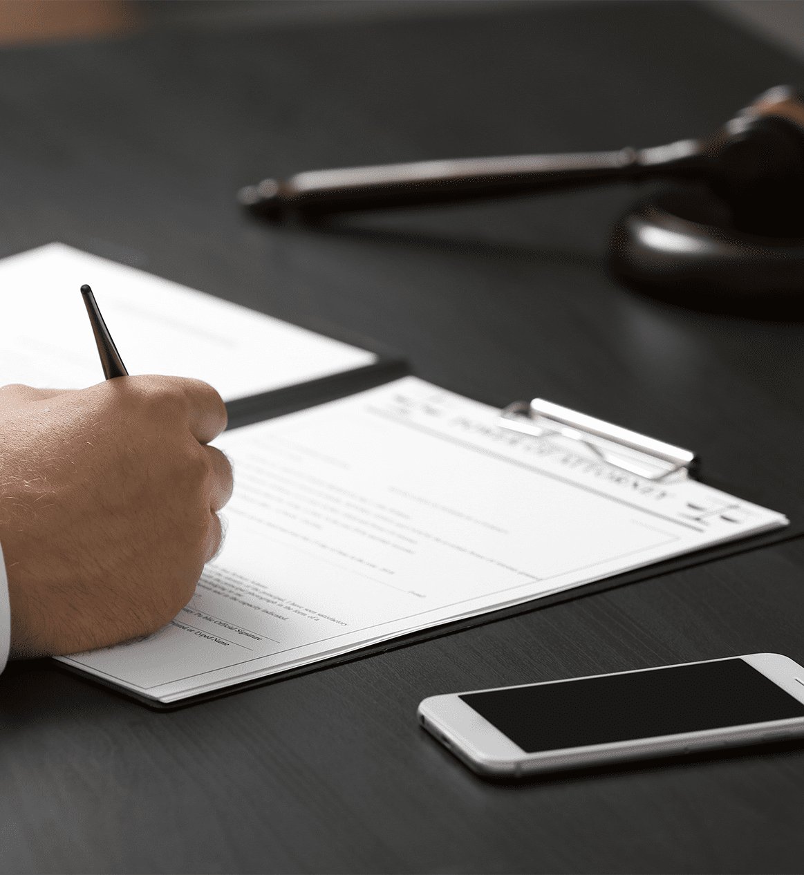 Two people reviewing a contract together